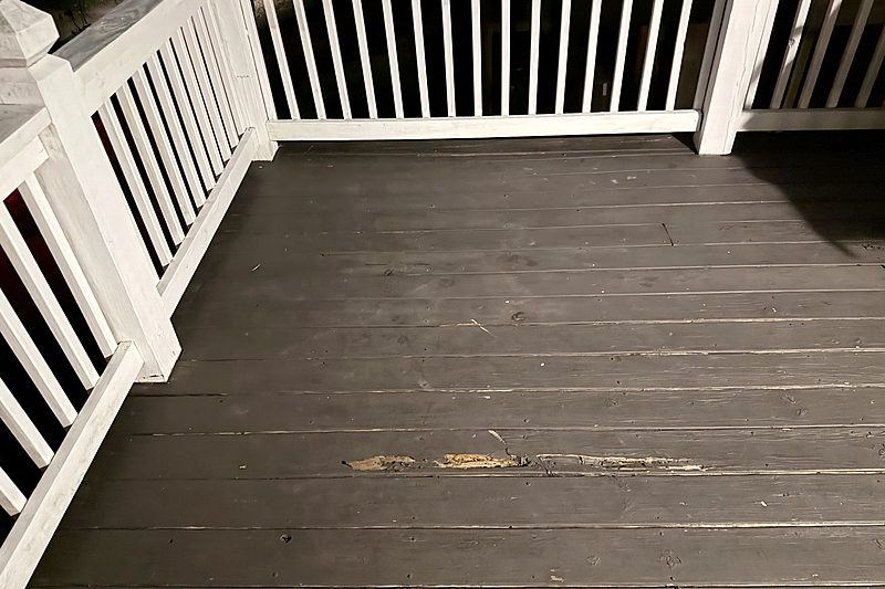 Before: Worn, split deck boards, Charlotte